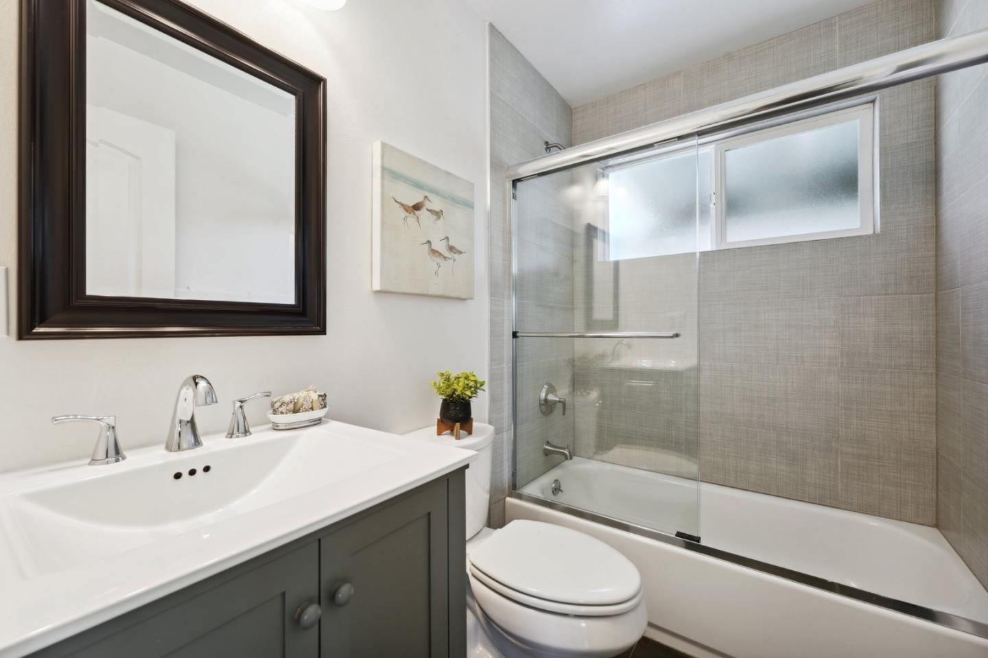 4615 Armour Drive Santa Clara, CA 95054 - Photo 23 of 35 a bathroom with a sink mirror toilet and bathtub