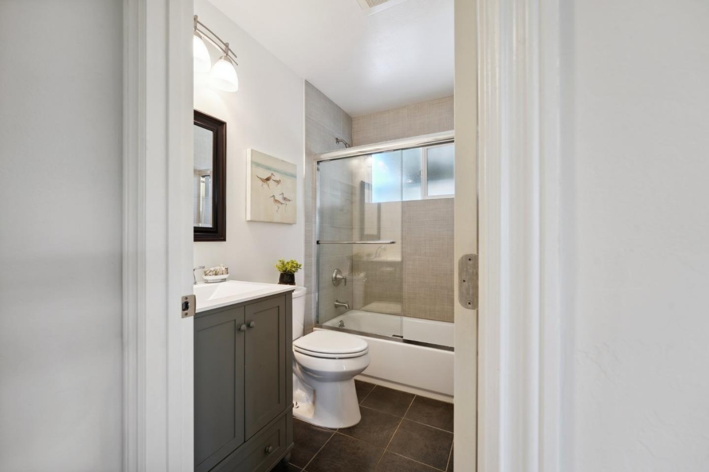 4615 Armour Drive Santa Clara, CA 95054 - Photo 24 of 35 a bathroom with a toilet sink and a mirror
