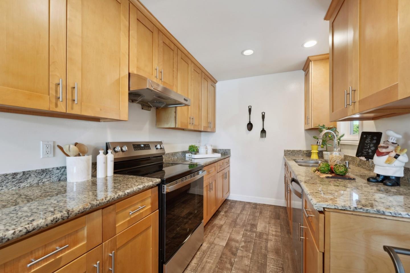 4615 Armour Drive Santa Clara, CA 95054 - Photo 8 of 35 a kitchen with granite countertop stainless steel appliances a sink a stove and cabinets