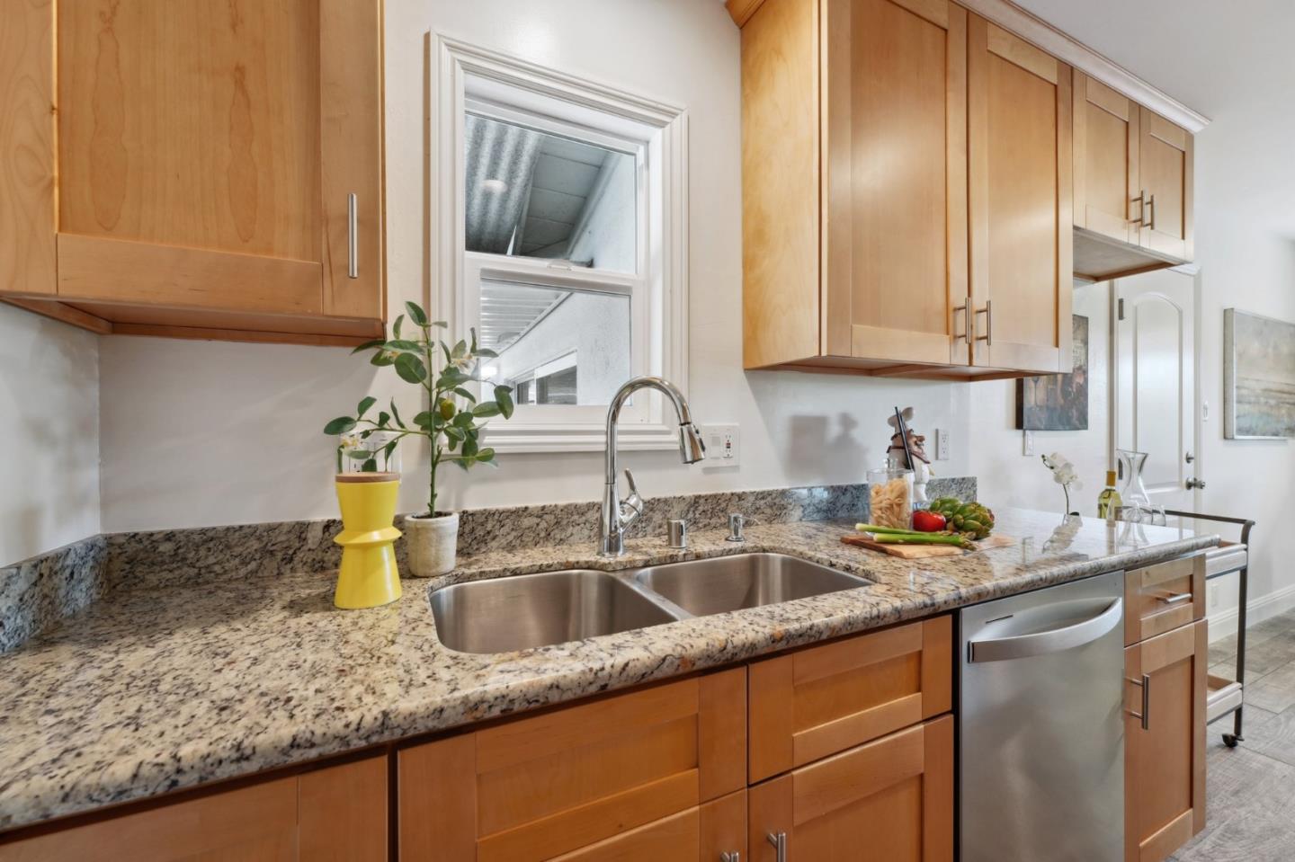 4615 Armour Drive Santa Clara, CA 95054 - Photo 9 of 35 a kitchen with stainless steel appliances granite countertop a sink a stove and cabinets