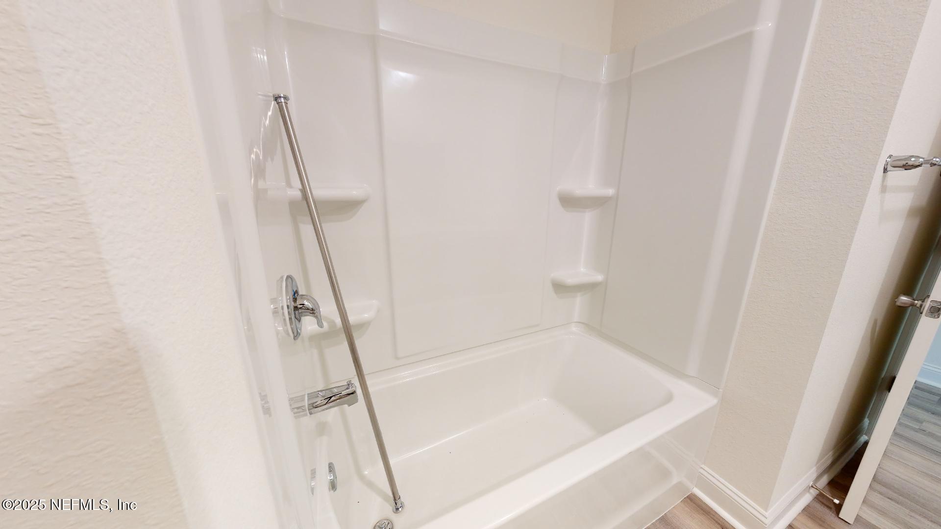 408 Bluejack Lane St. Augustine, FL 32095 - Photo 11 of 30 a bathroom with a bathtub