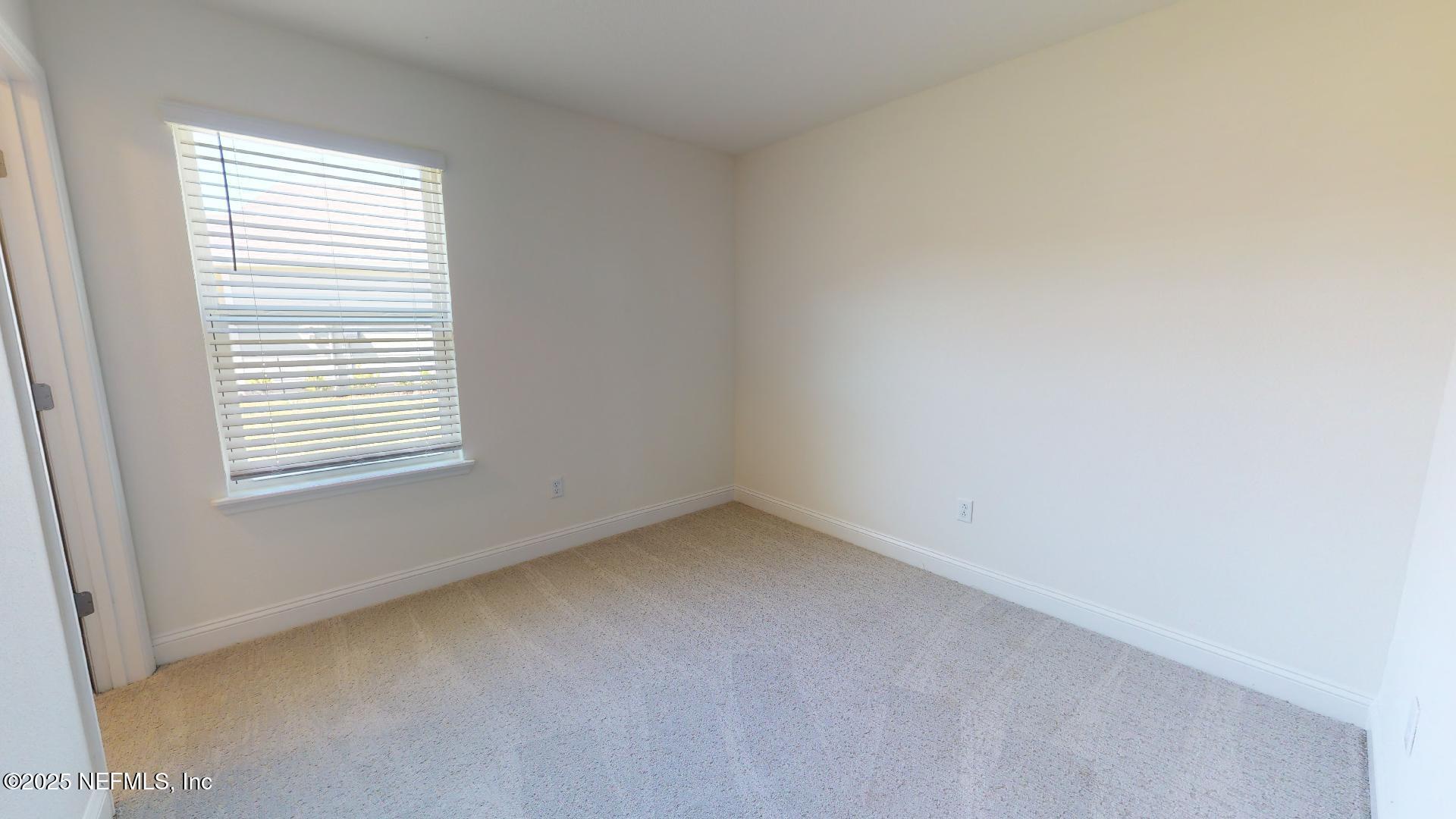 408 Bluejack Lane St. Augustine, FL 32095 - Photo 15 of 30 an empty room with a window
