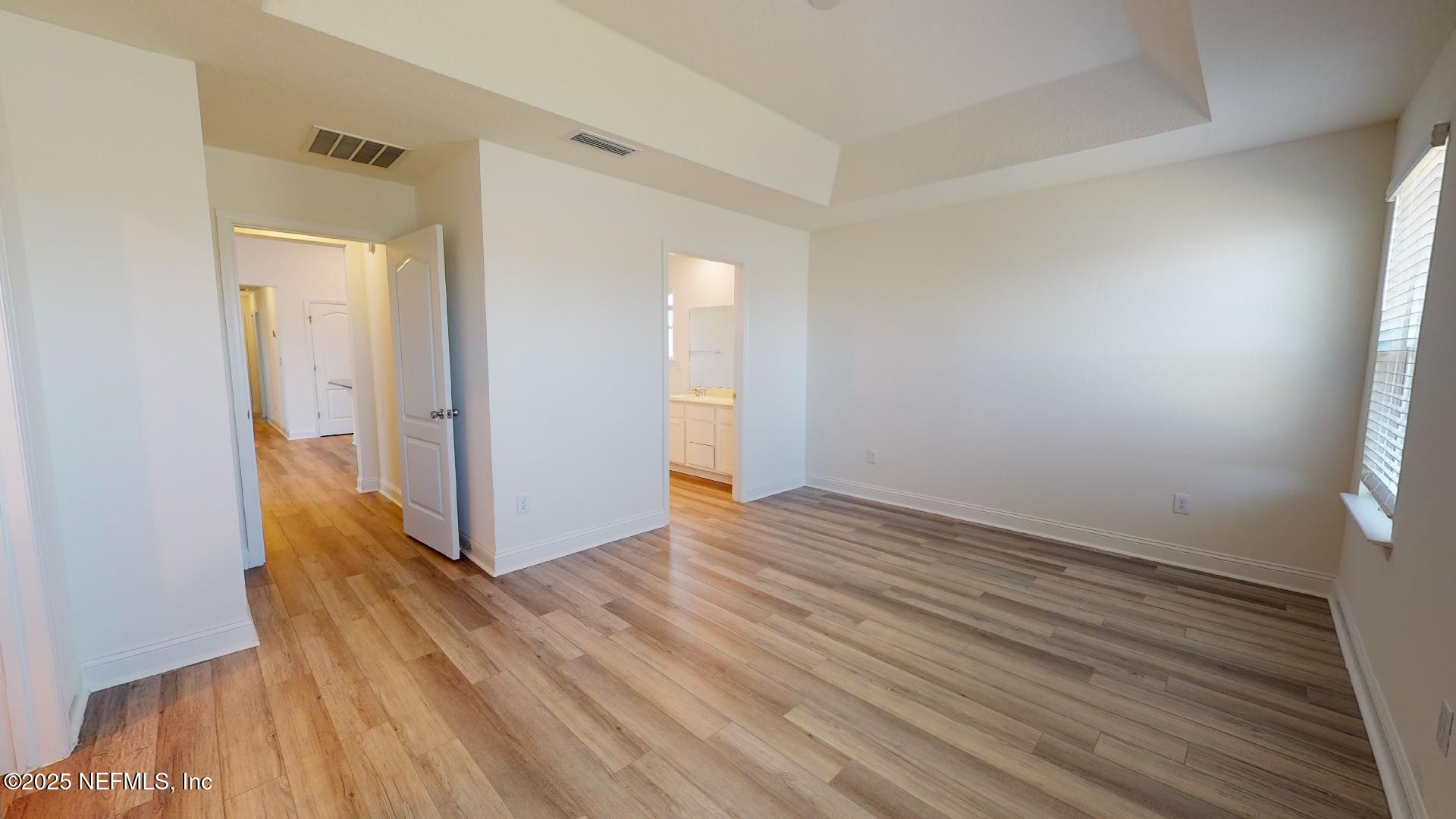 408 Bluejack Lane St. Augustine, FL 32095 - Photo 24 of 30 wooden floor in an empty room