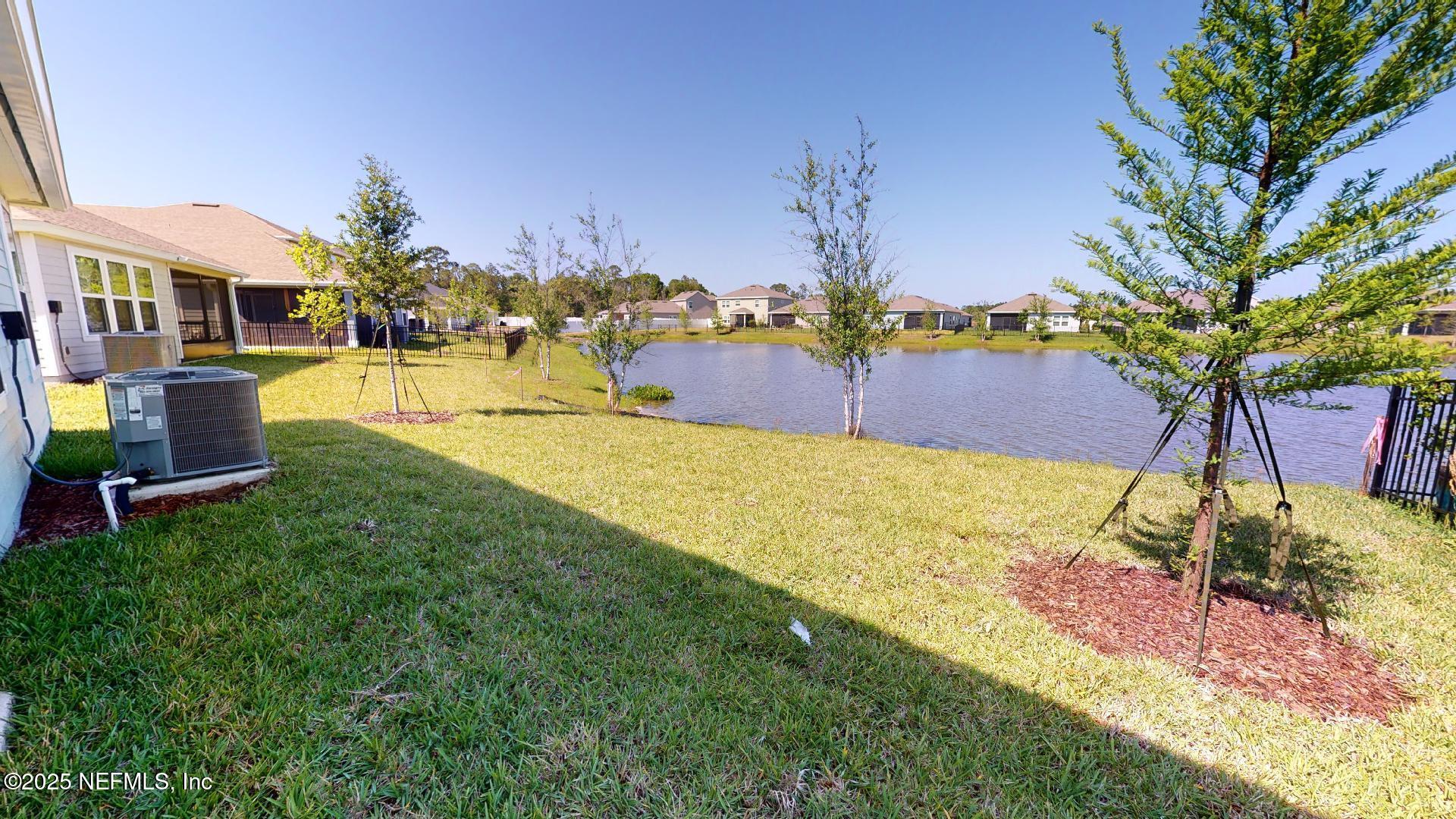 408 Bluejack Lane St. Augustine, FL 32095 - Photo 29 of 30 a view of a yard in front of the house
