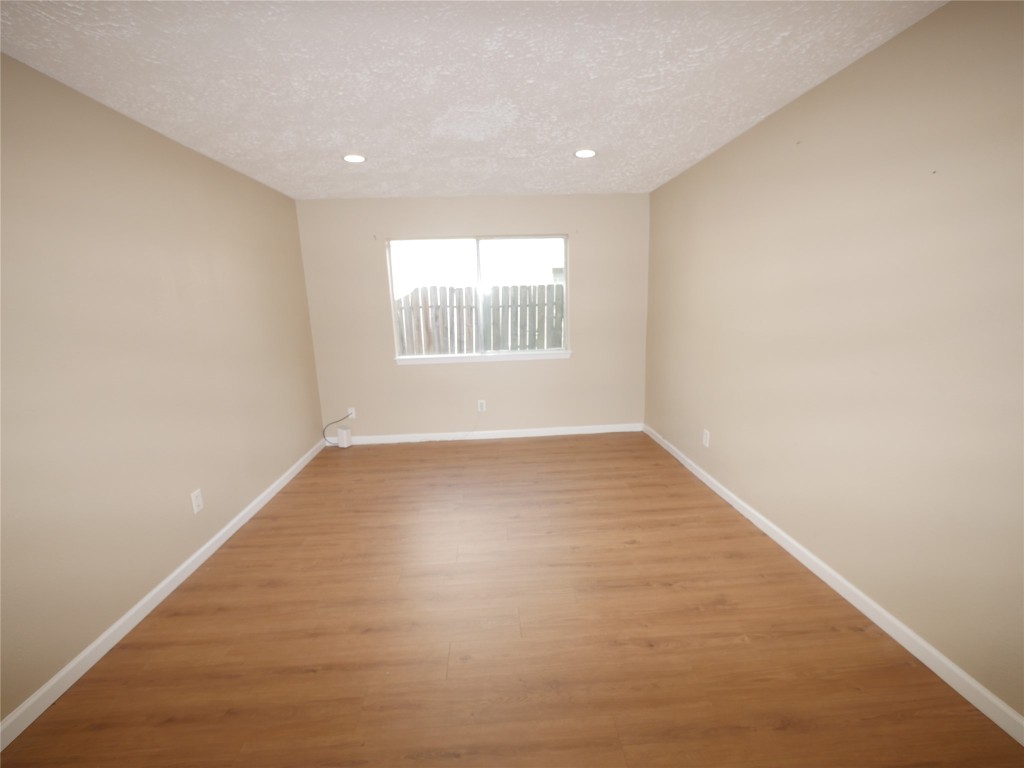 6826 Addicks Clodine Road Houston, TX 77083 - Photo 4 of 12 Extra Flexible office, Media gym or storage spaces included.