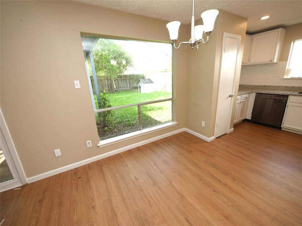 6826 Addicks Clodine Road Houston, TX 77083 - Photo 5 of 12 Open to kitchen, great for family meals or entertaining.