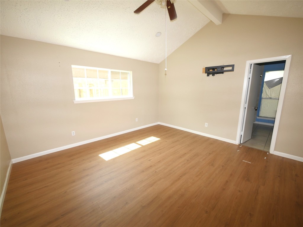 6826 Addicks Clodine Road Houston, TX 77083 - Photo 7 of 12 Comfortable retreat with fresh paint and new vinyl flooring.