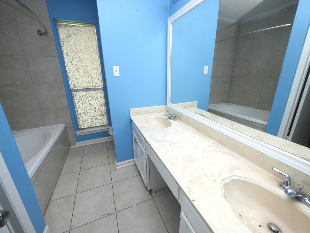 6826 Addicks Clodine Road Houston, TX 77083 - Photo 8 of 12 Fully updated with modern finishes and clean, stylish design.