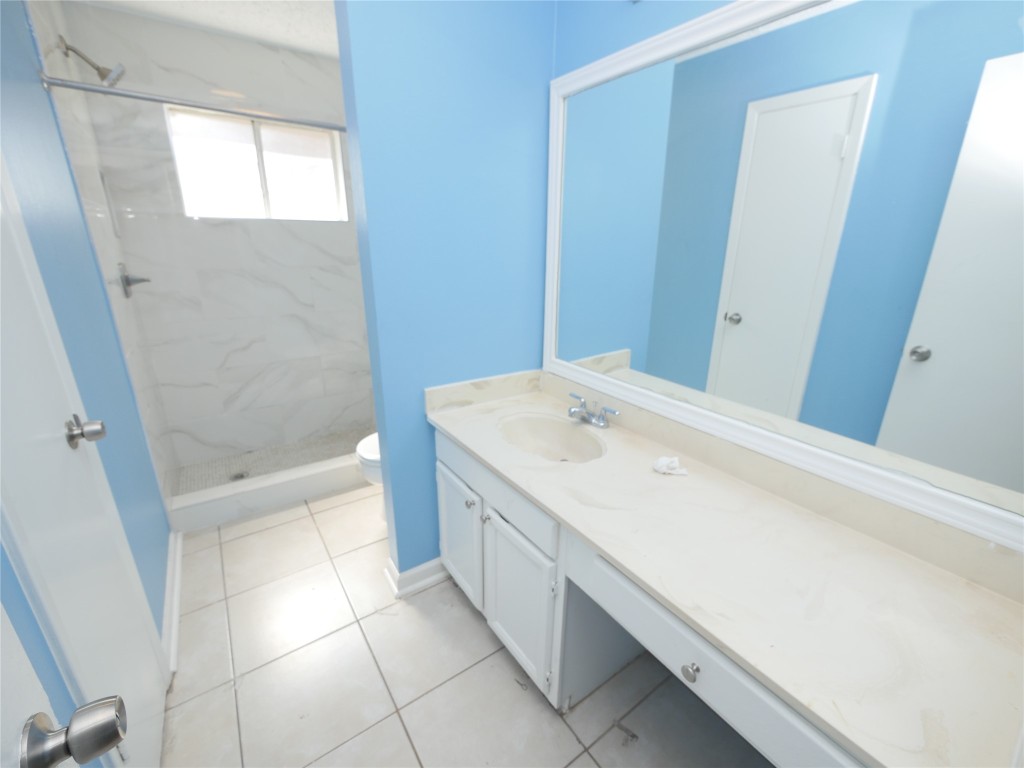 6826 Addicks Clodine Road Houston, TX 77083 - Photo 10 of 12 Secondary Bathroom Fully updated with modern finishes and clean, stylish design.
