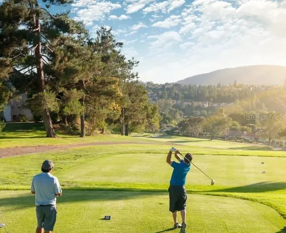 a view of an outdoor space and a lake view