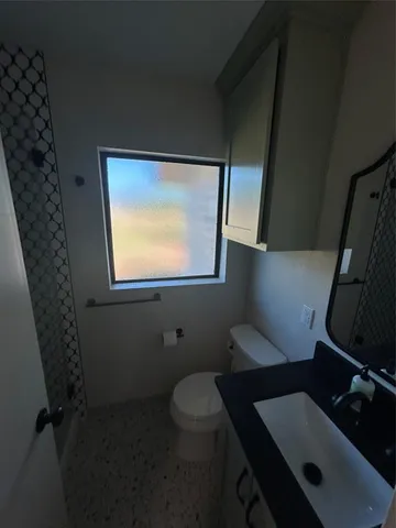 a bathroom with a toilet
