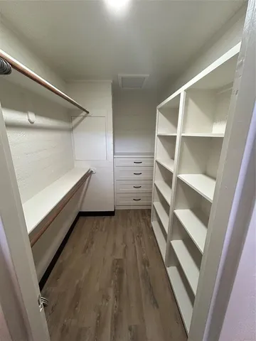 a view of an empty walk in closet