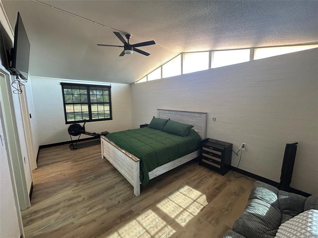 5400 Ridgeline Drive Abilene, TX 79606 - Photo 19 of 33 a bedroom with a bed and window