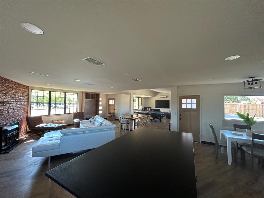 5400 Ridgeline Drive Abilene, TX 79606 - Photo 2 of 33 a living room with furniture and wooden floor