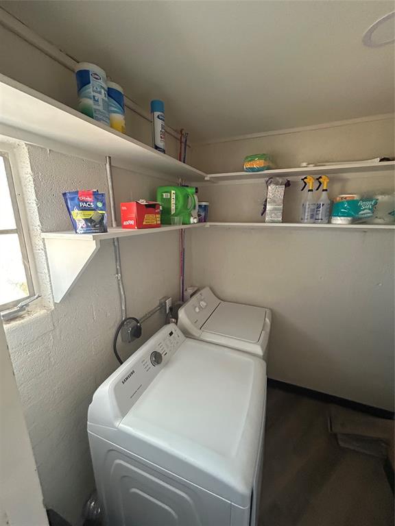 5400 Ridgeline Drive Abilene, TX 79606 - Photo 26 of 33 a utility room with dryer and washer