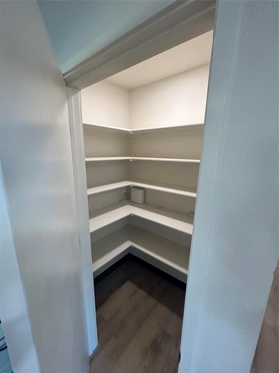 5400 Ridgeline Drive Abilene, TX 79606 - Photo 10 of 33 a storage room with wooden floor