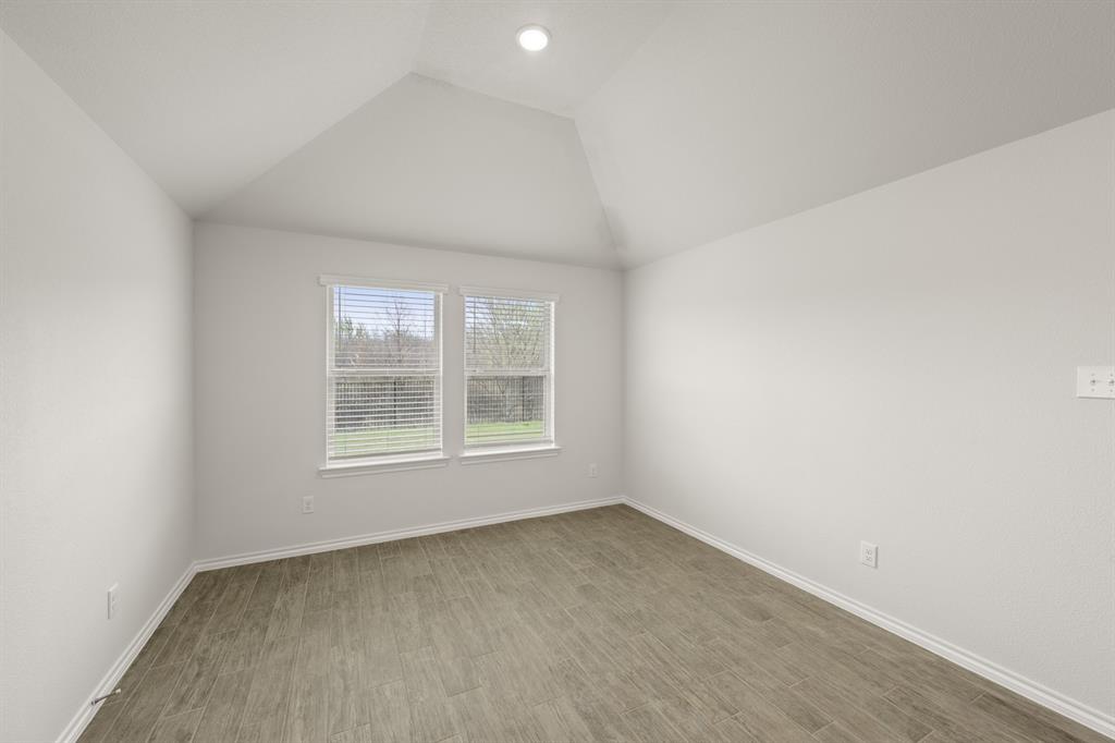 2607 Streamside Drive Burleson, TX 76028 - Photo 11 of 27 an empty room with a window
