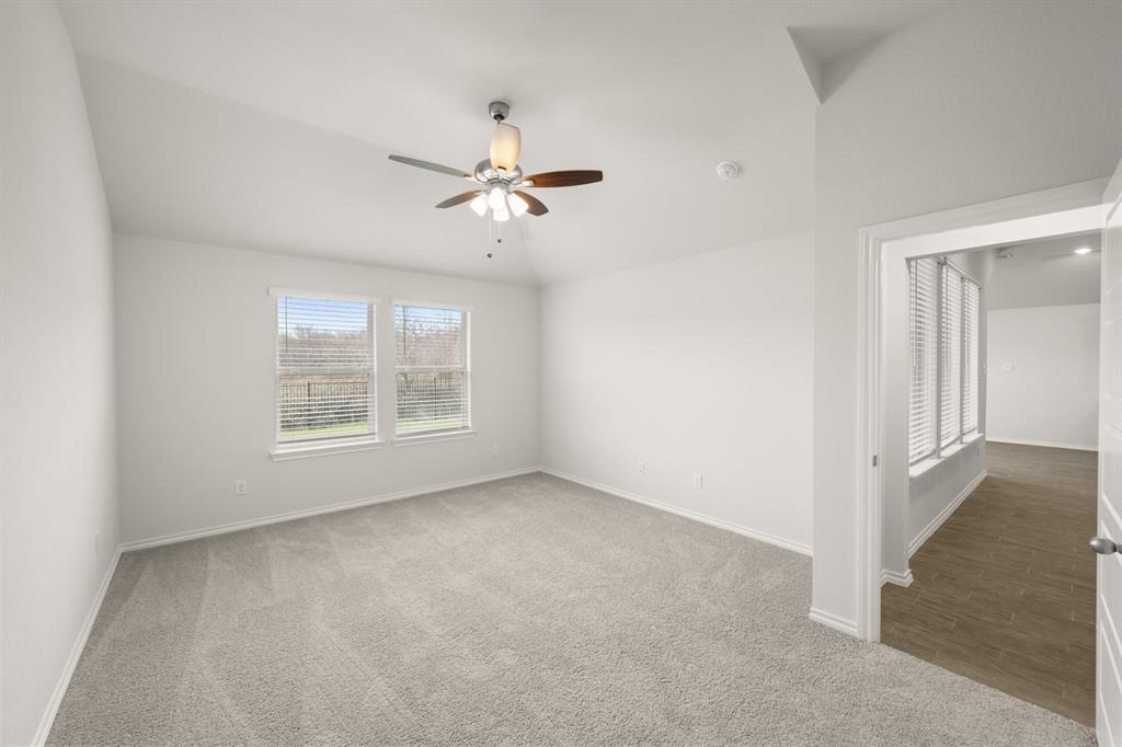 2607 Streamside Drive Burleson, TX 76028 - Photo 17 of 27 a view of an empty room with a window