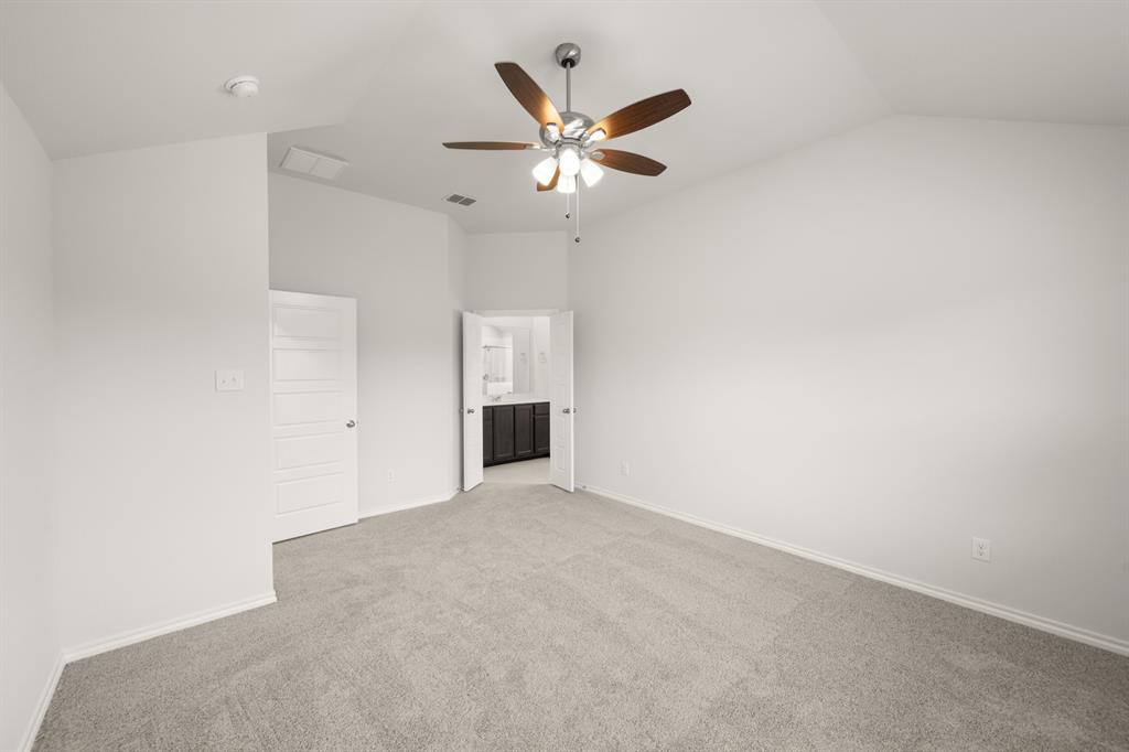 2607 Streamside Drive Burleson, TX 76028 - Photo 18 of 27 an empty room with closet and windows