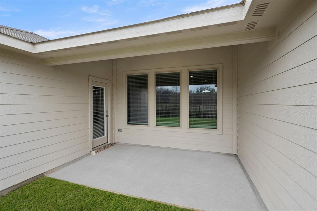 2607 Streamside Drive Burleson, TX 76028 - Photo 26 of 27 a view of an empty room with a window