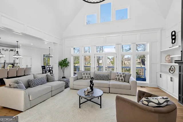 a bathroom with double sink and a mirror