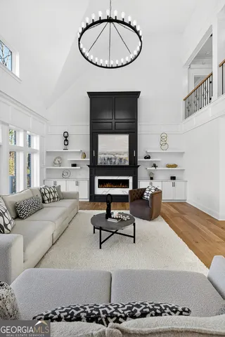 a bathroom with a shower and a window
