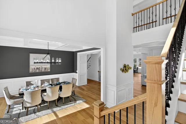 a front view of a building with a garden