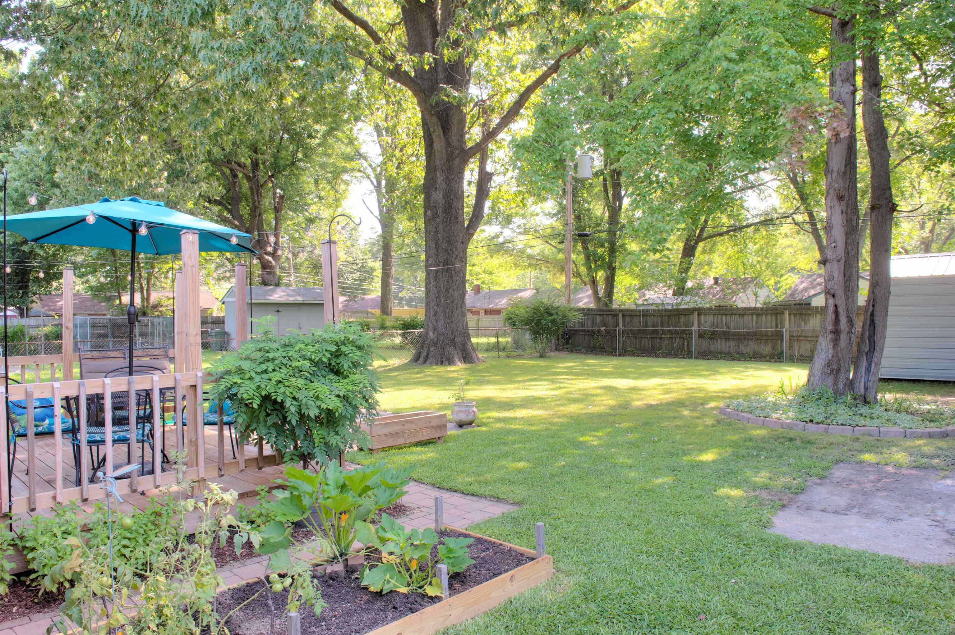 1612 Raymore Road Memphis, TN 38117 - Photo 16 of 17 a view of a house with a yard and sitting area