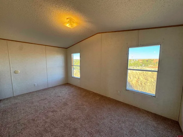 a view of balcony with wooden floor and city view