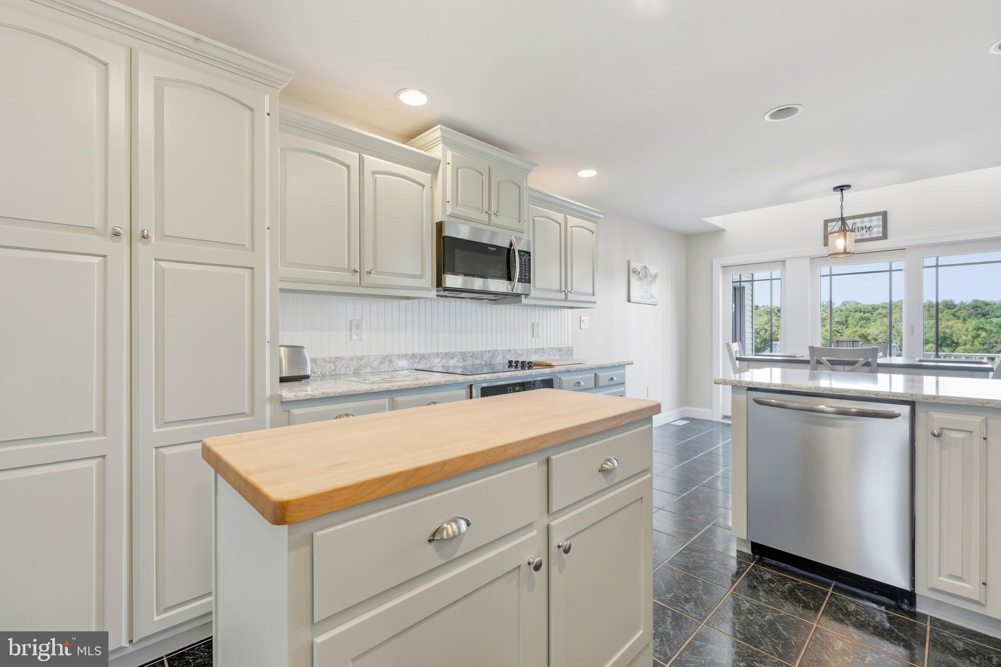 115 Scott Road Warwick, MD 21912 - Photo 13 of 32 a kitchen with a sink and cabinets