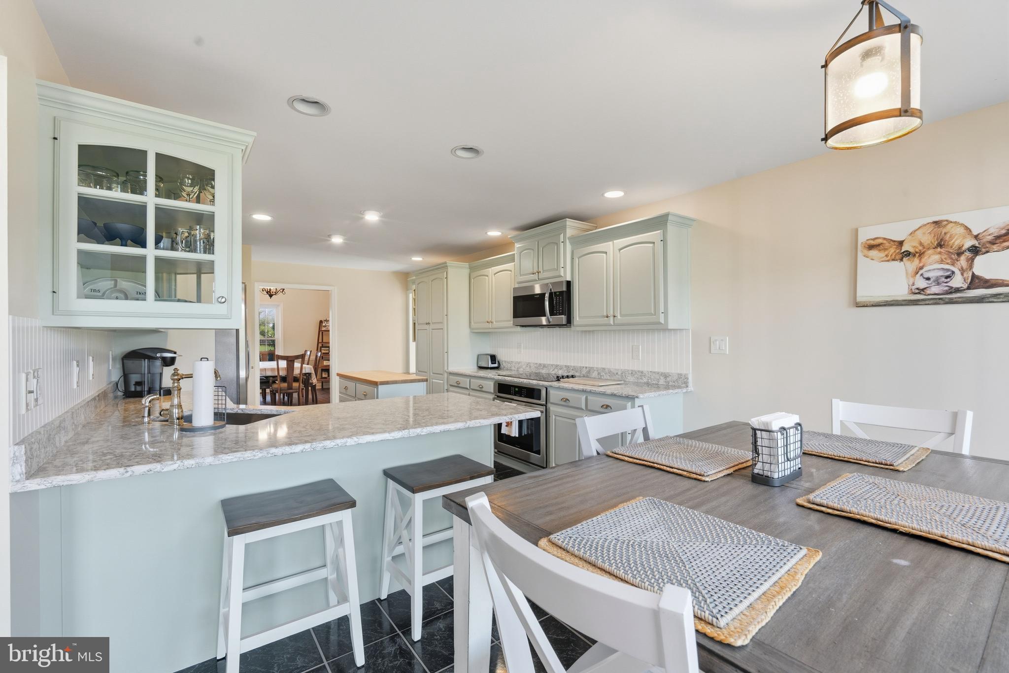 115 Scott Road Warwick, MD 21912 - Photo 15 of 32 a kitchen with a dining table chairs and view living room