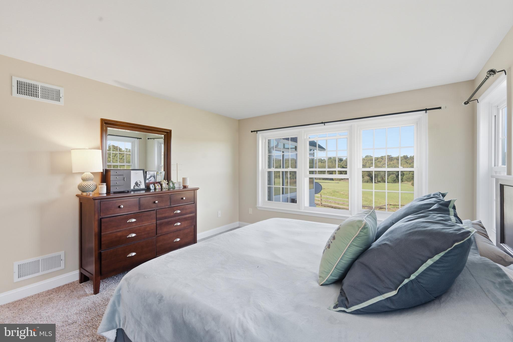 115 Scott Road Warwick, MD 21912 - Photo 18 of 32 a bedroom with a bed and a window