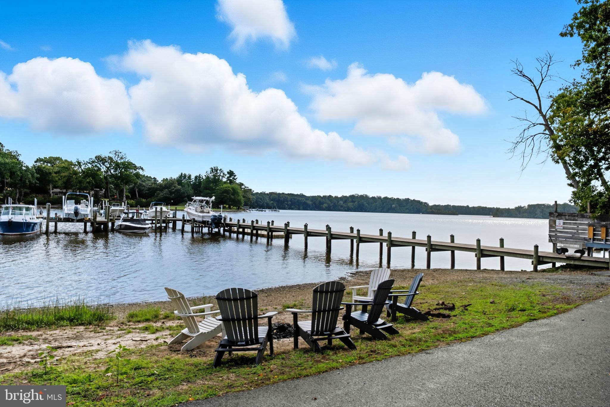 115 Scott Road Warwick, MD 21912 - Photo 7 of 32 a view of a lake with boats in front of it