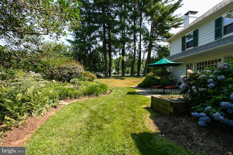 308 Golf Course Road Owings Mills, MD 21117 - Photo 22 of 30 Rear gardens; newly installed propane tank