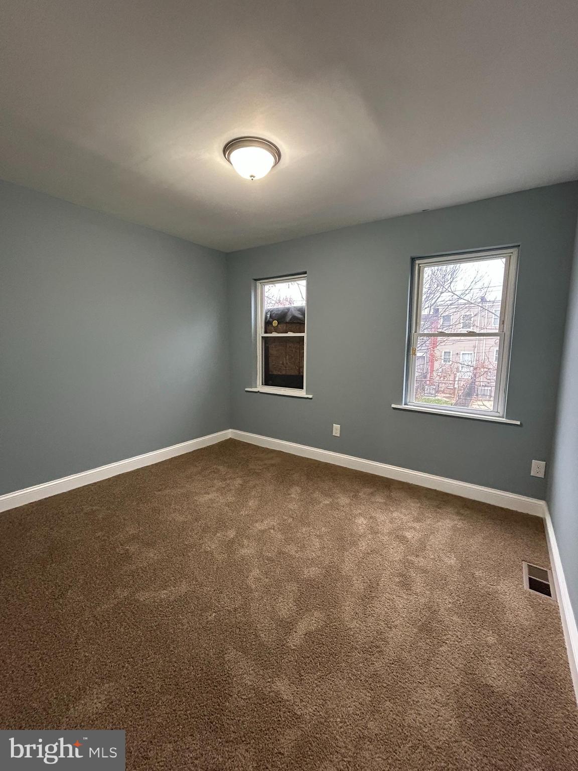 1930 Christian Street Baltimore, MD 21223 - Photo 14 of 20 an empty room with windows