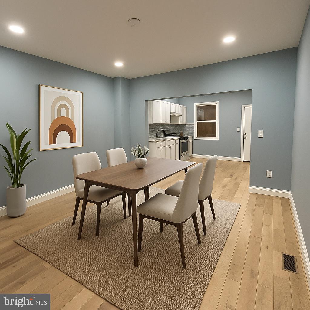 1930 Christian Street Baltimore, MD 21223 - Photo 3 of 20 a view of a dining room with furniture