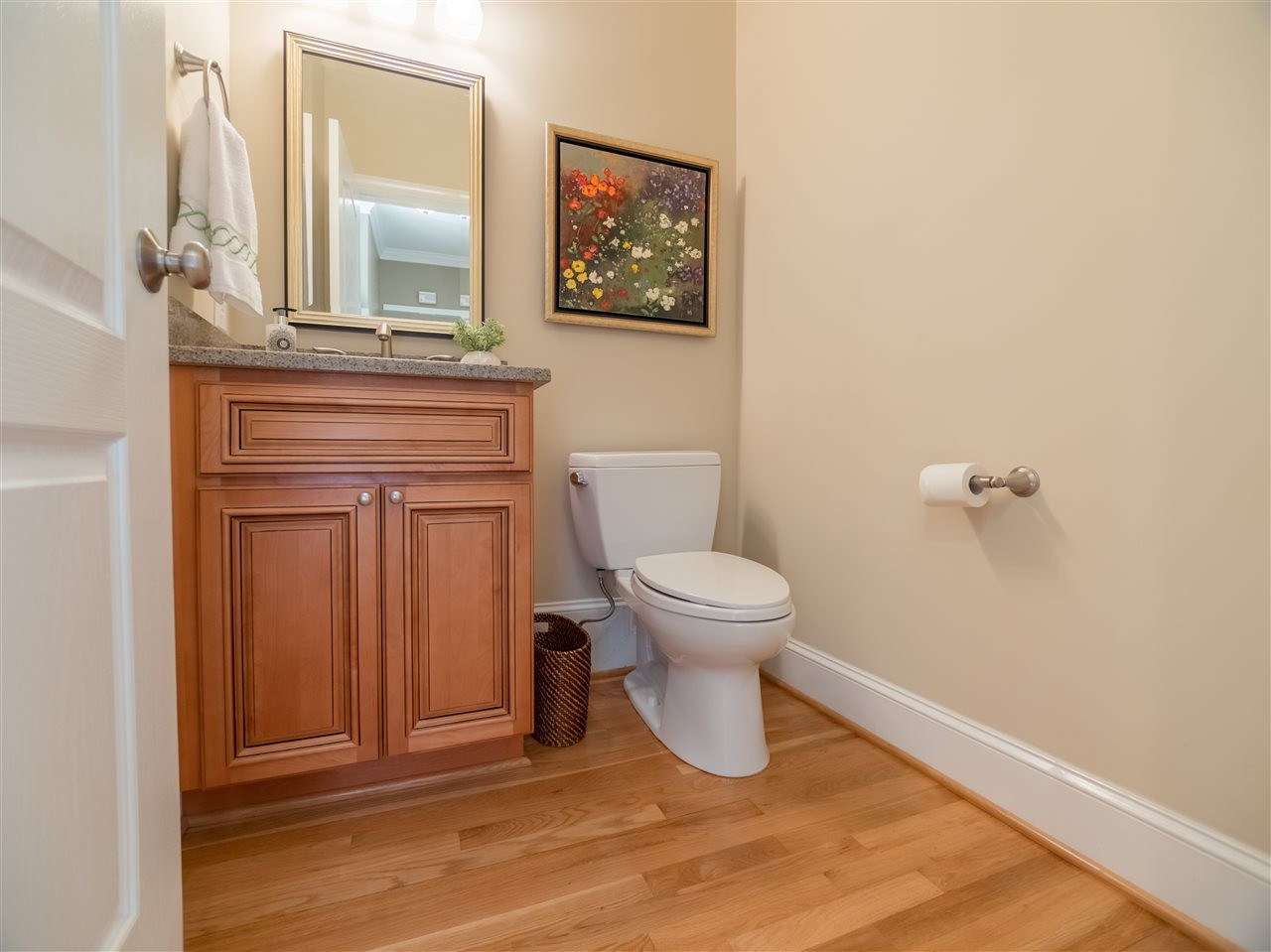 4016 White Chapel Way Raleigh, NC 27615 - Photo 11 of 30 Half bath has been updated with a comfort height cabinet, quartz top with u/m sink, brushed nickel fixtures and a Toto commode.