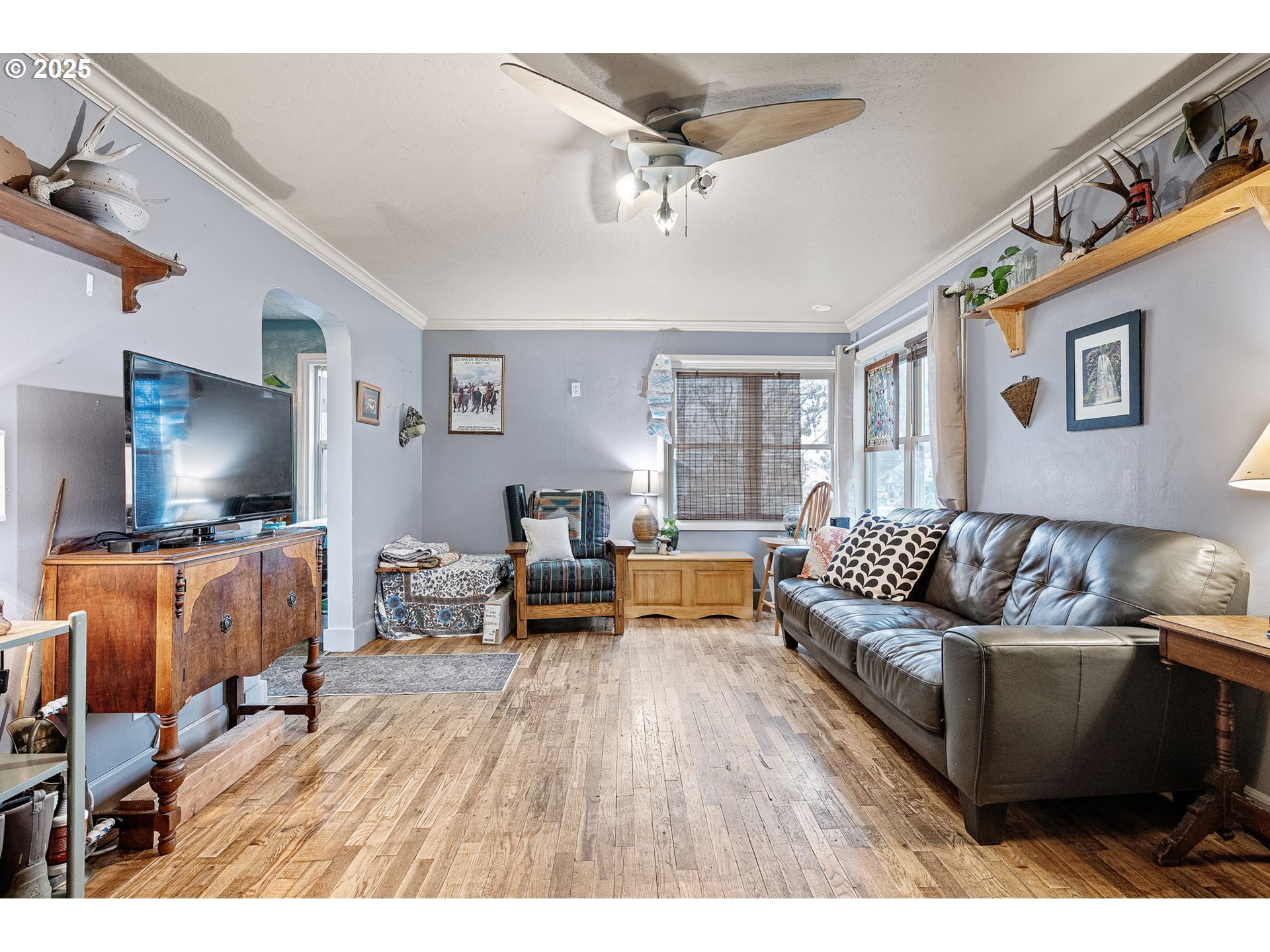 1425 East Madison Avenue Cottage Grove, OR 97424 - Photo 3 of 39 a living room with furniture and a flat screen tv