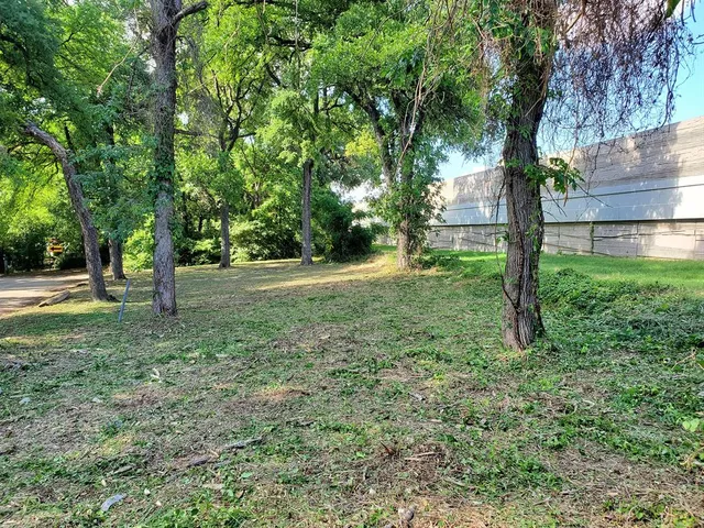 a view of outdoor space with deck and yard
