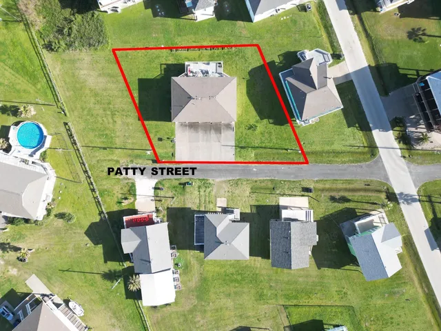 a view of swimming pool with a lounge chair