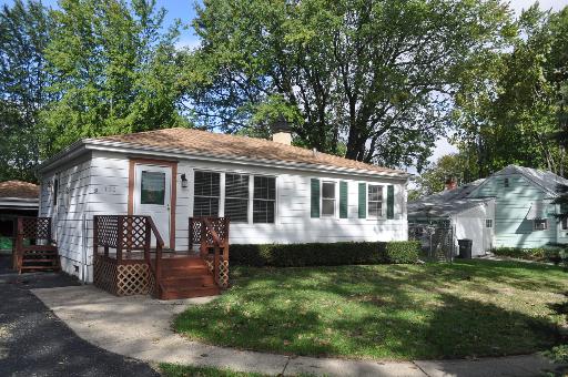 110 South Lyle Avenue Elgin, IL 60123 - Photo 1 of 13 a view of a house with a yard porch and sitting area
