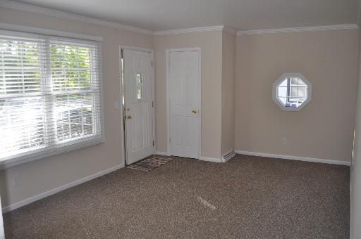 110 South Lyle Avenue Elgin, IL 60123 - Photo 2 of 13 an empty room with a window