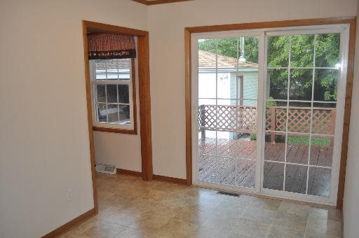 110 South Lyle Avenue Elgin, IL 60123 - Photo 6 of 13 an empty room with windows