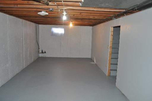 110 South Lyle Avenue Elgin, IL 60123 - Photo 9 of 13 a view of a room with racks on the wall