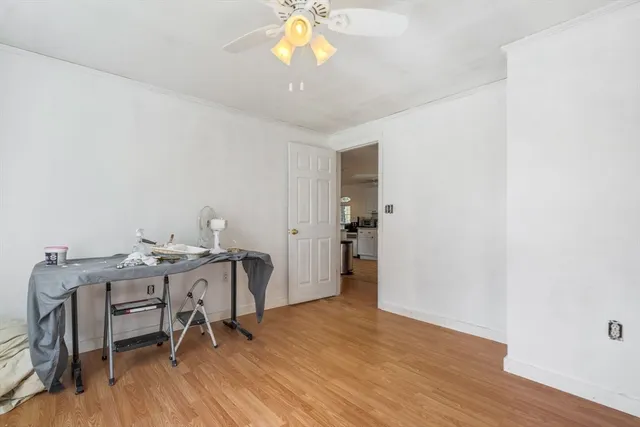 a view of a workspace with furniture and a workspace
