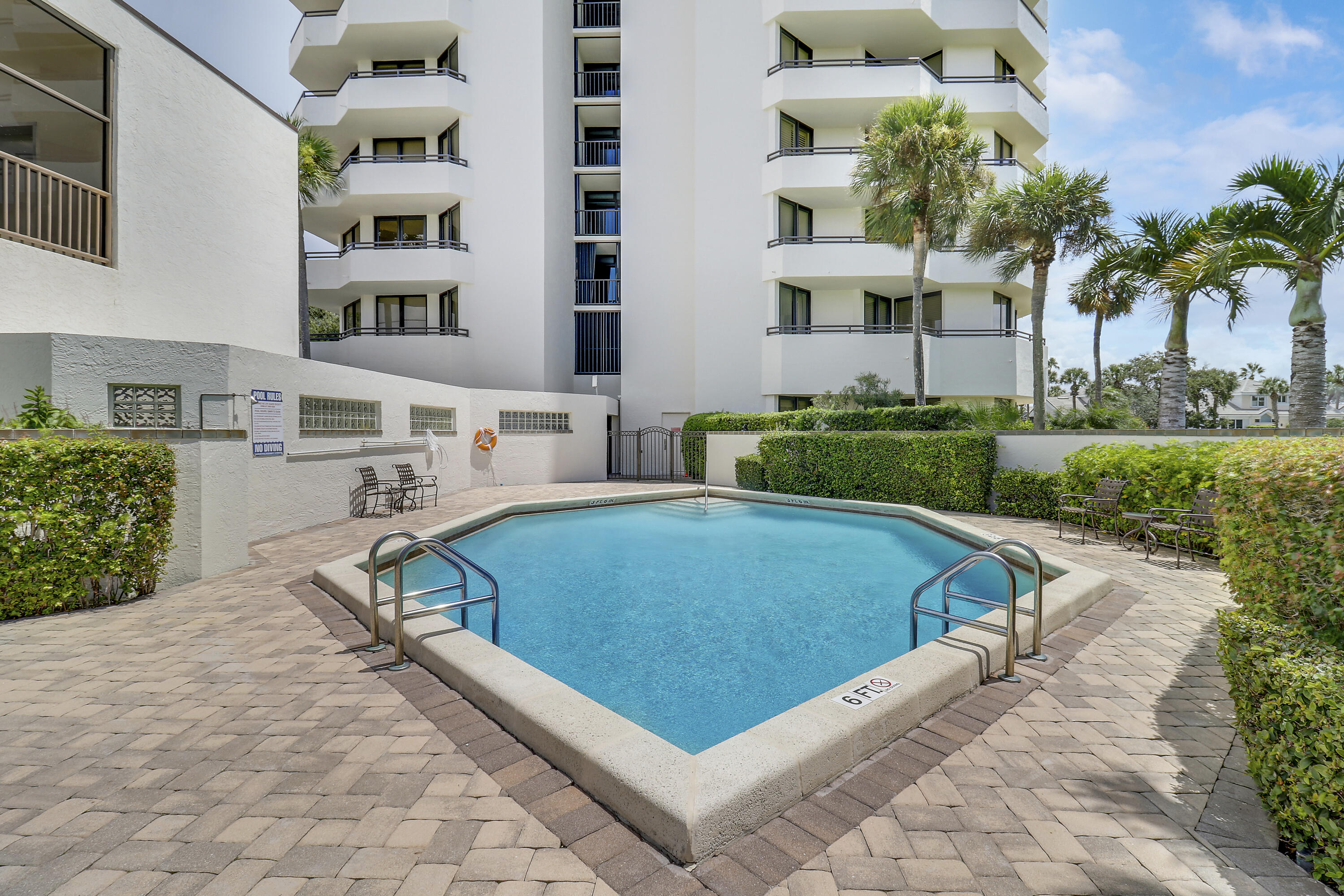 3322 Casseekey Island Road, Unit 604 Jupiter, FL 33477 - Photo 49 of 55 Pool and building