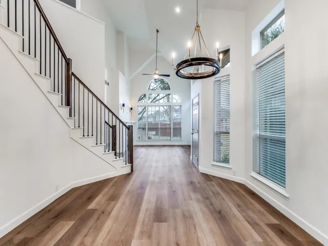 a view of entryway with wooden floor