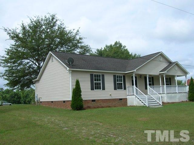 2695 Highway 42 Willow Spring, NC 27592 - Photo 22 of 22 a view of a house with a yard