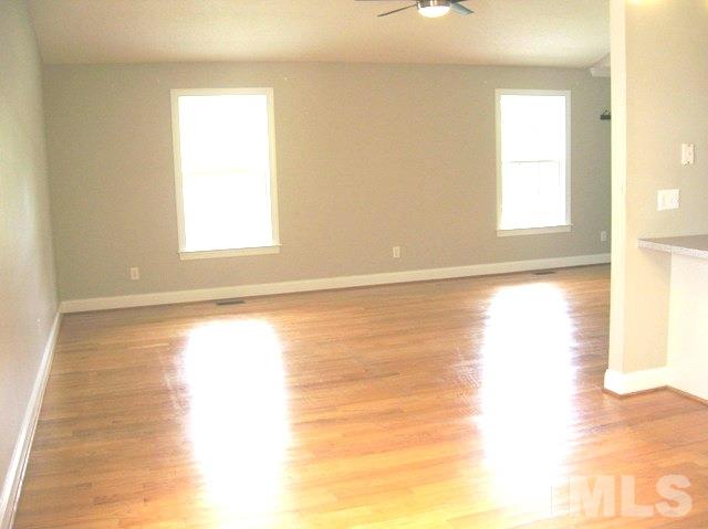 2695 Highway 42 Willow Spring, NC 27592 - Photo 7 of 22 a view of an empty room and window