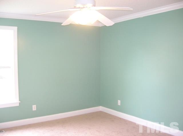 2695 Highway 42 Willow Spring, NC 27592 - Photo 10 of 22 a small space with a fan